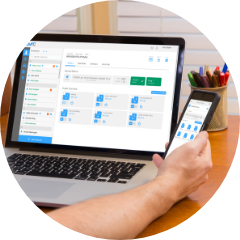 OvrC remote management dashboard opened on a laptop